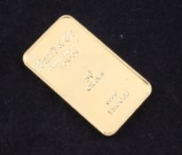 A Baird & Co 999.9 fine gold ingot, 50 grams, approx. 1.75in.