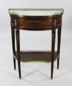 A Louis XVI mahogany demi-lune gueridon, with marble top and ormolu mounts, with pierced gallery and