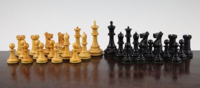 A Jaques boxwood and ebony Staunton pattern chess set, complete with thirty two pieces, the Kings