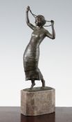 An Art Deco bronze stylish female dancer, holding beads aloft, on grey marble plinth base, unsigned,
