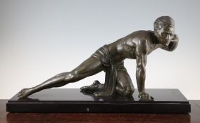 Attributed to J. de Roncourt. An Art Deco patinated metal figure of a crouching athlete, mounted