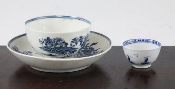 A Worcester blue and white `Fence` pattern tea bowl and saucer, c.1770, shaded crescent mark to