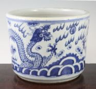 A Chinese blue and white `dragon` jardinere, with dragons amid clouds above waves, 24.5cm. diam.