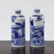 A near pair of Chinese blue and white snuff bottles, 1830-1900, each painted with figures on a boat,