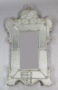 An Italian Venetian glass mounted mirror, Muranoin 18th century style, of cartouche form with an