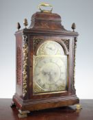 A George III mahogany bracket clock, the arched brass dial with silvered strike silent, chapter ring