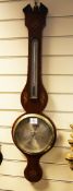 A Regency inlaid mahogany wheel barometer, with silvered thermometer and dial, signed Smith, London,