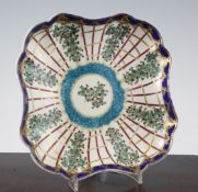 A Worcester polychrome `Hop Trellis` pattern square dish, c.1775, decorated with a gilded cobalt