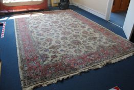 A Turkish sparta carpet, with field of scrolling foliage on a cream ground, with three row foliate