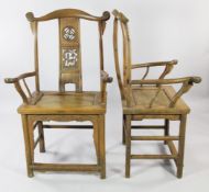 A pair of provincial Chinese armchairs, the single splat back carved with swastika motif and a