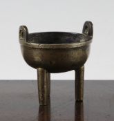 A small Chinese bronze and silver inlaid tripod censer, 17th / 18th century, of hemi-spherical