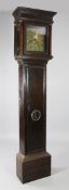 Kemp and Holman, Lewes. A thirty hour oak longcase clock, the 11 inch square brass dial with