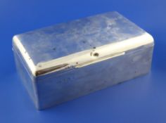 A large Edwardian silver mounted cigarette/cigar box by Elkington & Co, of rectangular form with