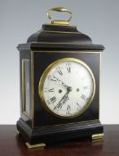 An early 18th century brass mounted ebonised hour repeating bracket clock, the enamel dial with