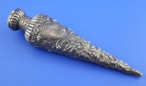 A late Victorian repousse silver teardrop shaped scent flask, with fluted shoulder, engraved
