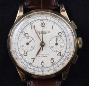 A gentleman`s 1950`s? Swiss 18ct gold chronograph manual wind wrist watch, with Arabic numerals
