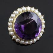 A gold, amethyst and split pearl set brooch, of circular form, 1in.