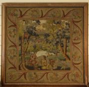 A 19th century needlework panel, depicting figures with baskets of fruit within a wooded landscape