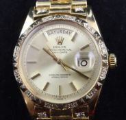 A gentleman`s 1960`s 18ct gold and after market diamond set Rolex Oyster Perpetual Day Date wrist