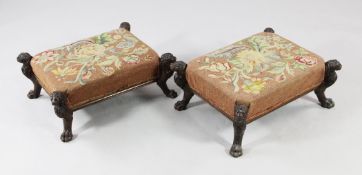 A pair of 19th century rectangular upholstered foot stools, with lion carved monopodia supports, W.