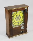 An oak cased Penny Arcade game, numbered 591, c.1950, 18.5in.
