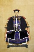 A Chinese ancestor portrait, late Qing dynasty, depicting a gentleman wearing mandarin robes