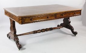 A large early Victorian mahogany library table, fitted two frieze drawers opposing two dummy