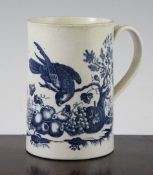 A Worcester blue and white `Parrot Pecking Fruit` pattern mug, c.1780, shaded crescent mark to base,