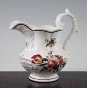 A Staffordshire creamware christening jug, early 19th century, painted with flower sprays and