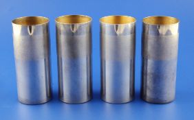 A set of four late 1960`s silver beakers by Desmond Clen-Murphy, with textured band, London, 1968,