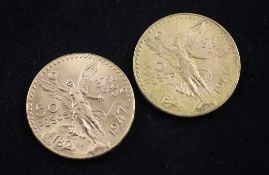 Two Mexican Centenario 50 pesos gold coins.