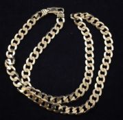 A large 9ct gold curb link chain necklace, 63 grams, 22.5in.