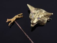 An early 20th century 18ct gold and rose cut diamond set fox head brooch, 1in and a 15ct gold fox