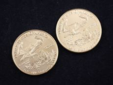 Two US Gold Eagle 50 dollar coins.
