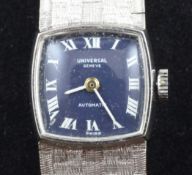 A lady`s 14ct white gold Universal manual wind wrist watch, with shaped square blue Roman dial, on