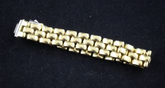 An Italian two colour 18ct gold flexible brick link bracelet, with pave diamond set clasp, gross