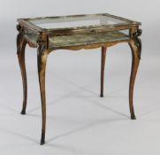 A 19th century French kingwood and ormolu mounted bijouterie table, with glazed top and sides,