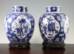 A pair of Chinese blue and white ovoid jars and covers, Kangxi four character mark, Guangxu