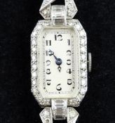 A 1960`s platinum and diamond cocktail watch, with octagonal Arabic dial, the case and shoulders set