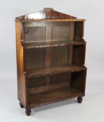A Victorian mahogany waterfall bookcase, on turned feet, W.2ft 10.5in.