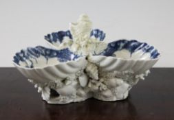 A Worcester blue and white shell pickle stand, c.1768, modelled as three scalloped shells on a