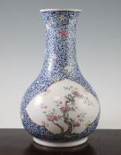 A Chinese famille rose blue ground baluster vase, Qianlong mark, Republic period, painted to ruyi