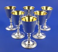 A set of six 1970`s silver wine goblets, with tapered bowls and turned stems, C.J. Vander Ltd,