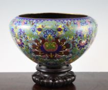 A Chinese cloisonne enamel alms bowl, Qianlong four character, but later, decorated with lotus