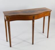 An Edwardian satinwood serpentine side table, the top painted with triple reserves depicting fruit