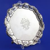 A George II silver waiter, of shaped circular form, with engraved armorial and base inscription