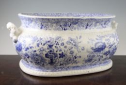 A Staffordshire blue and white Florentine pattern foot bath, c.1830, of lobed oblong shape, with a