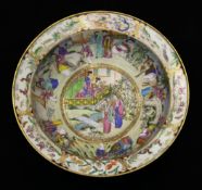 A Chinese famille rose basin, early 19th century, painted with continuous band of figures in