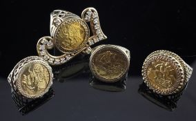Four gold half sovereign rings, 1982(3) & 2001(1), with later 9ct gold shanks.