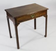 A George III mahogany side table, with single drawer and chamfered square section legs, W.2ft 6in.